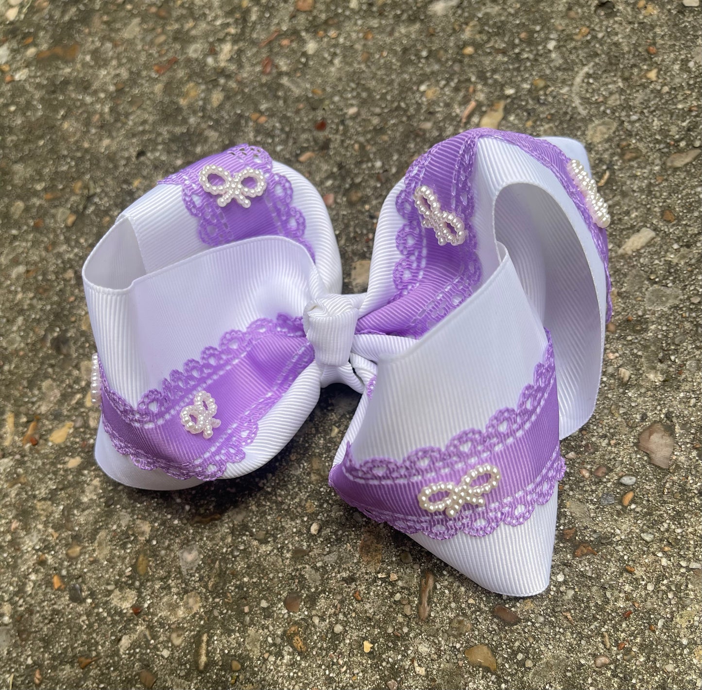 White ribbon bow with lace