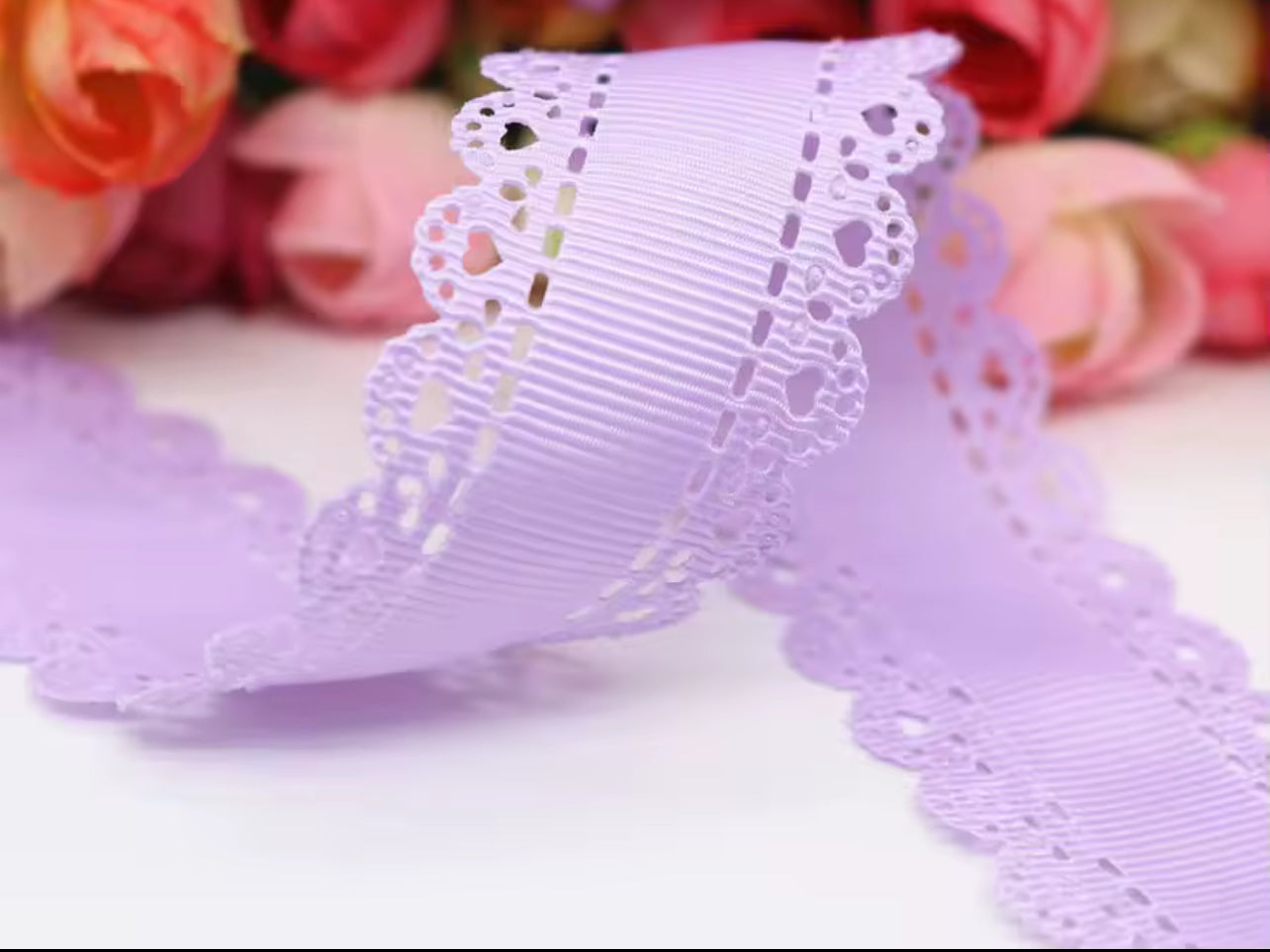 White ribbon bow with lace