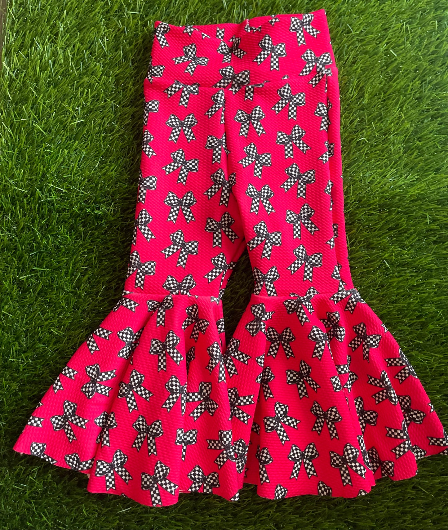 Checkered bows on hot pink