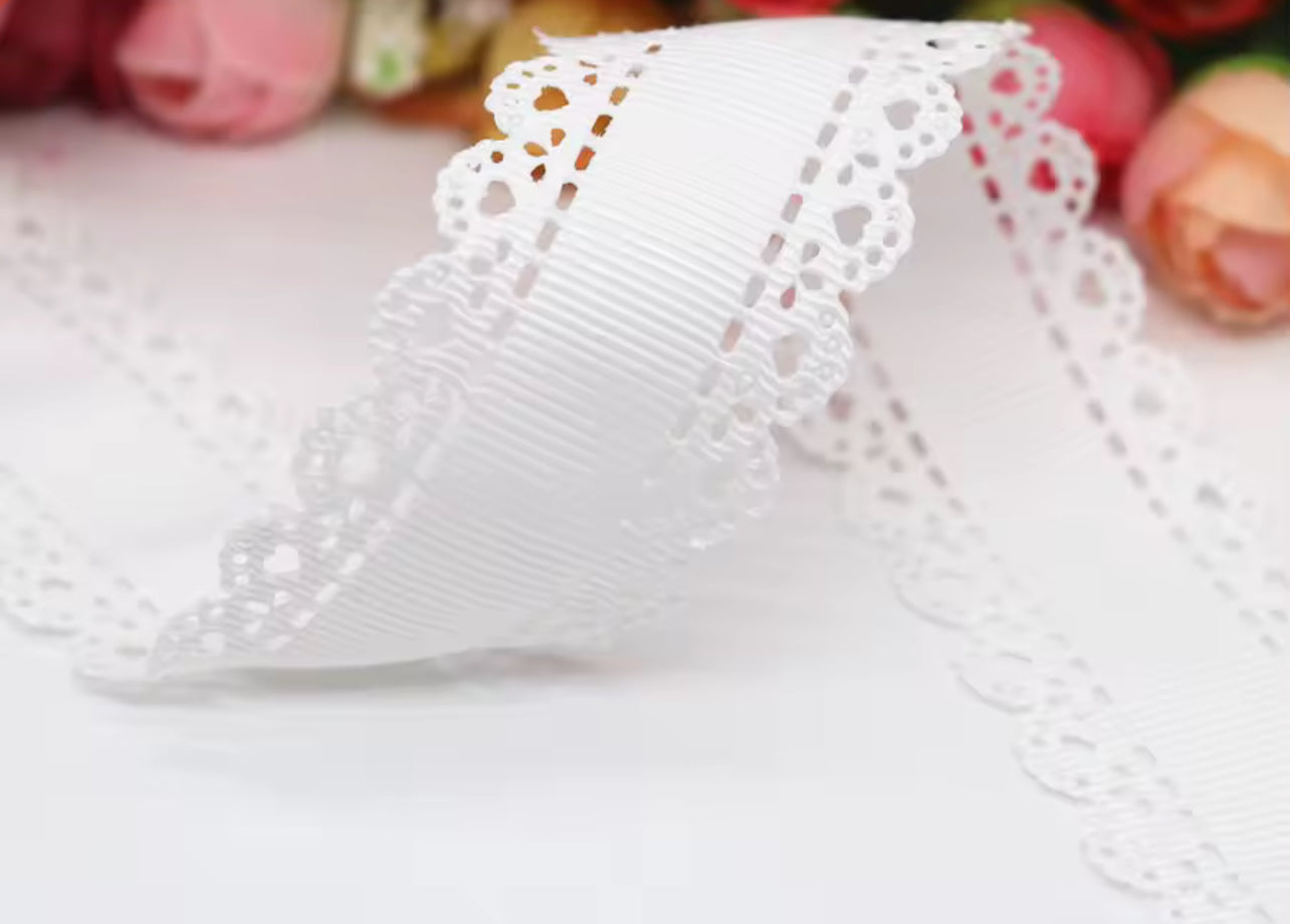 White ribbon bow with lace