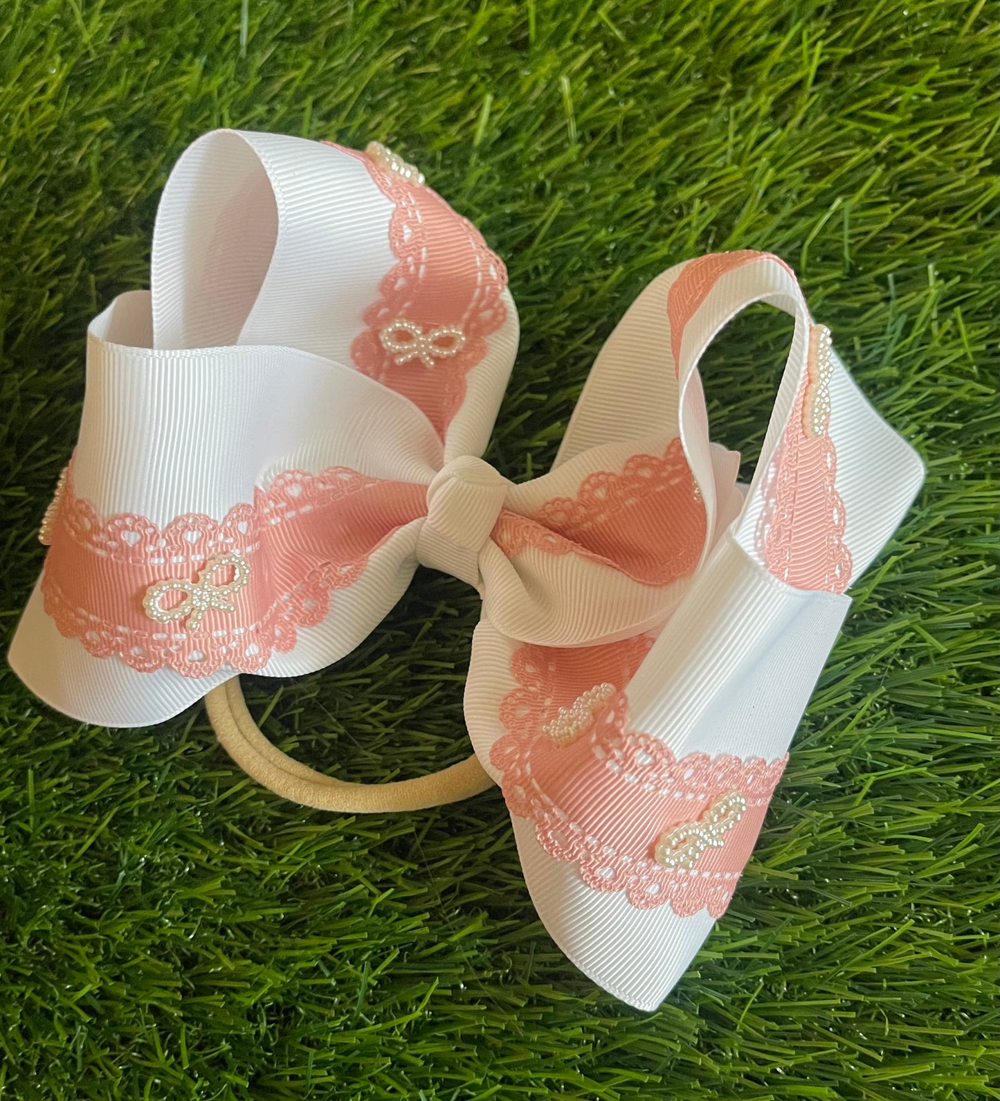 White ribbon bow with lace