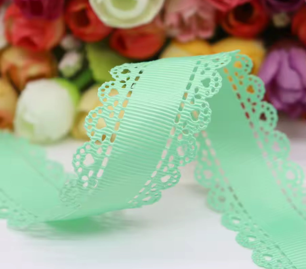 White ribbon bow with lace
