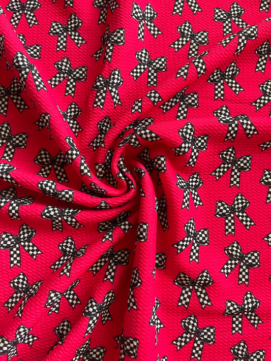 Checkered bows on hot pink