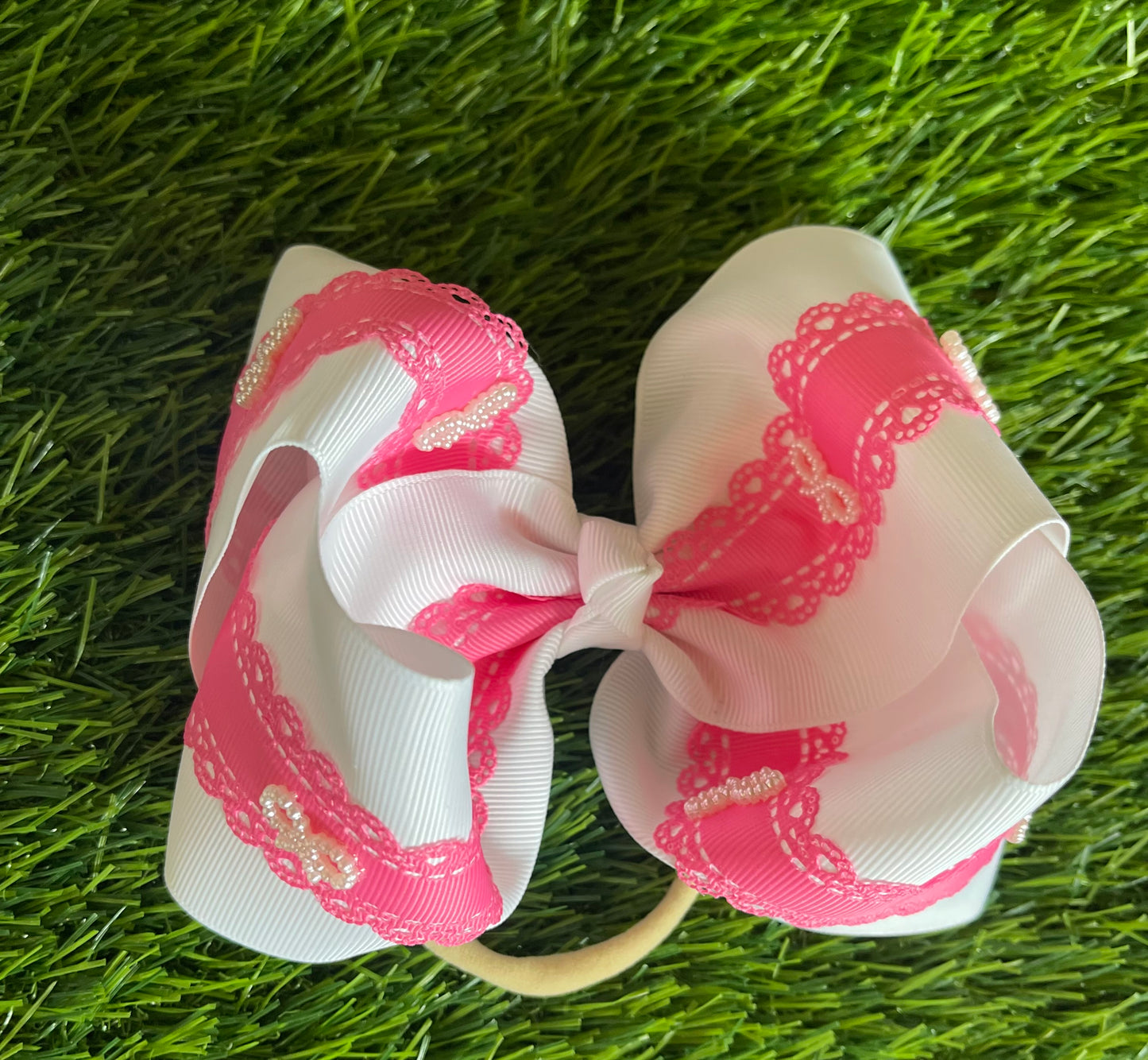 White ribbon bow with lace